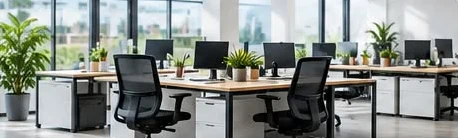 Modern office with desks, computers and chairs